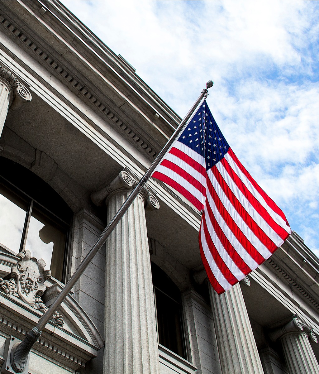 American flag flying over courthouse